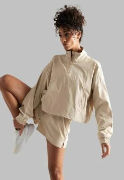 Aim'n Café Au Lait - Outdoorjas - Beige -Damesmode 2d71414d85f94d88b2e892c881310efa